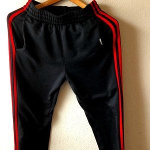 Adidas black sweatpants with red stripes down the sides - size Large 14-16